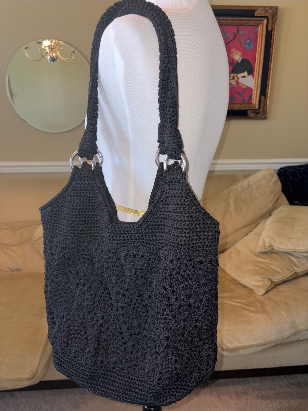 The Sak Black Crochet Shoulder Bucket Bag with silver Ring Accents